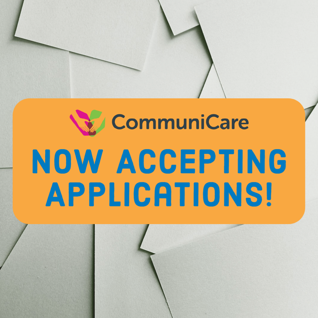 Scattered paper background with text that reads "Now Accepting Applications!"